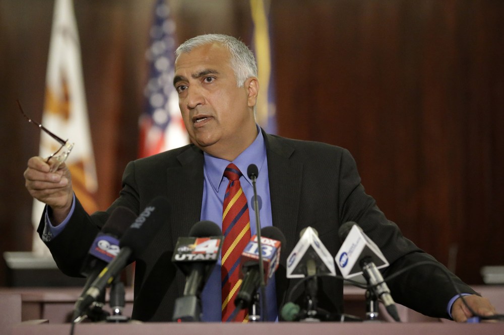 In this June 19, 2014, file photo, District Attorney Sim Gill speaks during a new conference, in Salt Lake City. (Photo by Rick Bowmer/AP)