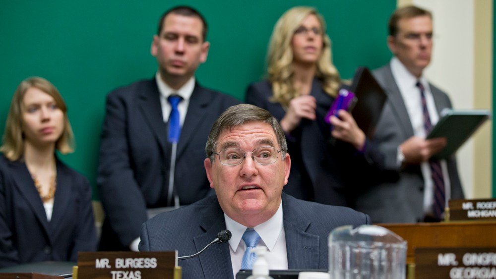 Rep. Michael C. Burgess, R-Texas, questions Health and Human Services Secretary Kathleen Sebelius as she testifies before the House Energy and Commerce Committee on Capitol Hill in Washington, Wednesday, Oct. 30, 2013.