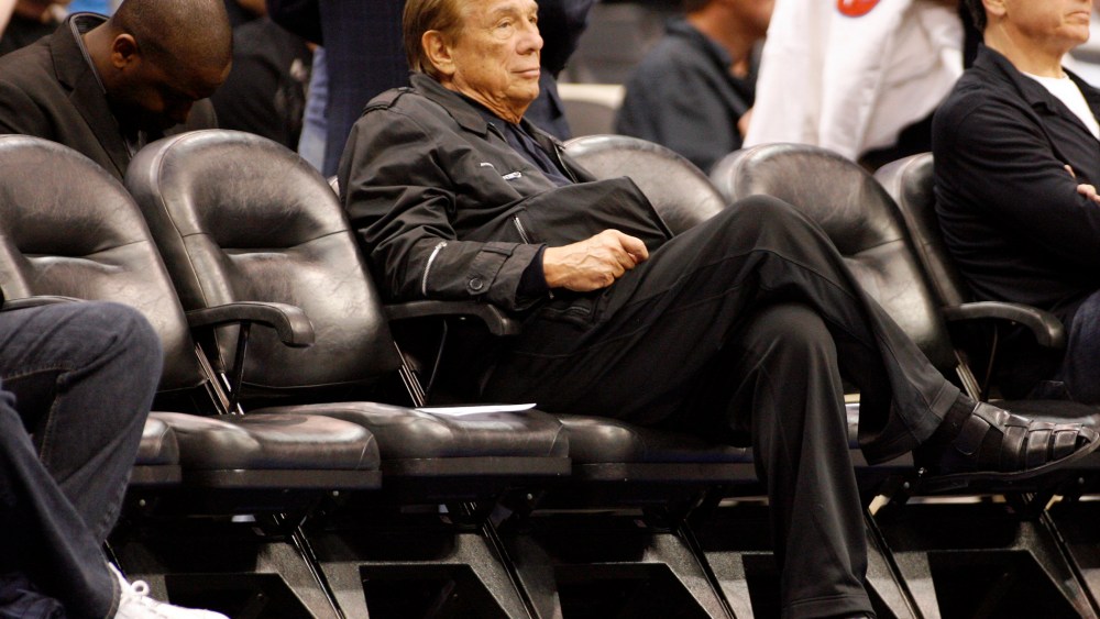 In this April 4, 2010, file photo, Los Angeles Clippers owner Donald Sterling sits court side during the NBA basketball game between the New York Knicks and the Los Angeles Clippers.