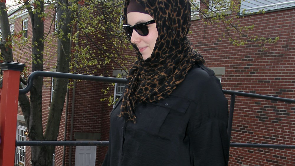 Katherine Russell, right, wife of Boston Marathon bomber suspect Tamerlan Tsarnaev, leaves the law office of DeLuca and Weizenbaum Monday, April 29, 2013, in Providence, R.I. (Photo by Stew Milne/AP Photo)