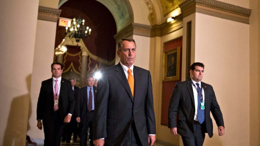 Speaker of the House John Boehner walks to the chamber for the vote on a Senate-passed bill that would avert a threatened Treasury default and reopen the government in Washington, Wednesday, Oct. 16, 2013.
