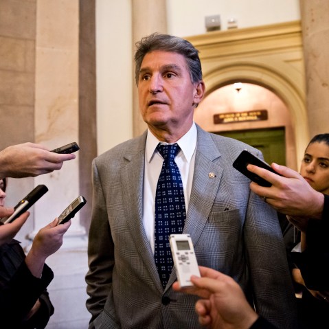 Sen. Joe Manchin, D-W.Va., is questioned for updates by reporters at the Capitol in Washington, Monday, Oct. 14, 2013, as a partial government shutdown enters its third week.
