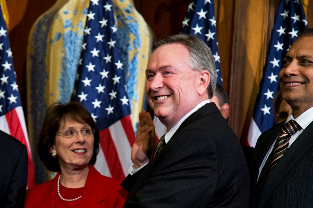 Rep. Steve Stockman, R-Texas, second from right, participates in a mock swearing-in ceremony for the 113th Congress on in Washington, Jan. 3. 2013.