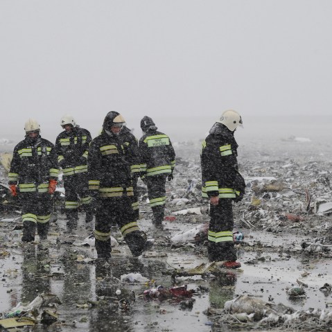 Russian Emergency Ministry employees are seen among the wreckage of a crashed plane at the Rostov-on-Don airport, about 950 kilometers (600 miles) south of Moscow, Russia, March 19, 2016. (Photo by STR/AP)