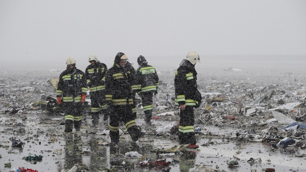 Russian Emergency Ministry employees are seen among the wreckage of a crashed plane at the Rostov-on-Don airport, about 950 kilometers (600 miles) south of Moscow, Russia, March 19, 2016. (Photo by STR/AP)