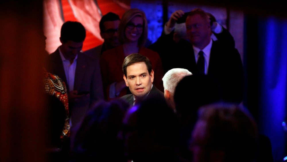 Republican presidential candidate, Sen. Marco Rubio, R-Fla., talks with Anderson Cooper during a commercial break at a CNN town hall event, Feb. 16, 2016, in Greenville, S.C. (Photo by Paul Sancya/AP)