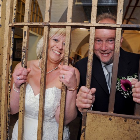 They say it's a life sentence, but Derek and Sandra Todd couldn't be happier than when they attached their ball and chain, literally, becoming the first to wed inside the Old Police Cells in Brighton, East Sussex, May 20, 2015. (Photo by Rex Features/AP)