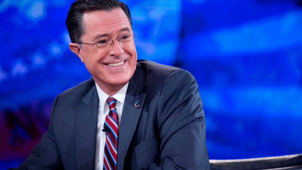 Stephen Colbert smiles while taping the "The Colbert Report" with United States President Barack Obama in Lisner Auditorium on the campus of George Washington University in Washington, D.C., Dec. 8, 2014. (Photo by Andrew Harrer/picture-alliance/dpa/AP)