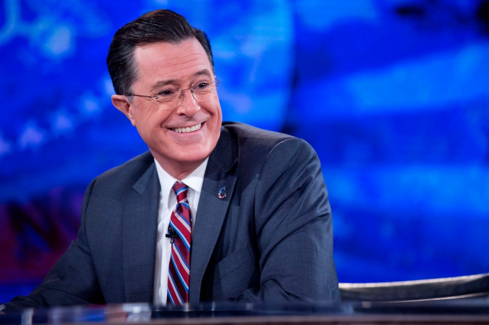 Stephen Colbert smiles while taping the "The Colbert Report" with United States President Barack Obama in Lisner Auditorium on the campus of George Washington University in Washington, D.C., Dec. 8, 2014. (Photo by Andrew Harrer/picture-alliance/dpa/AP)