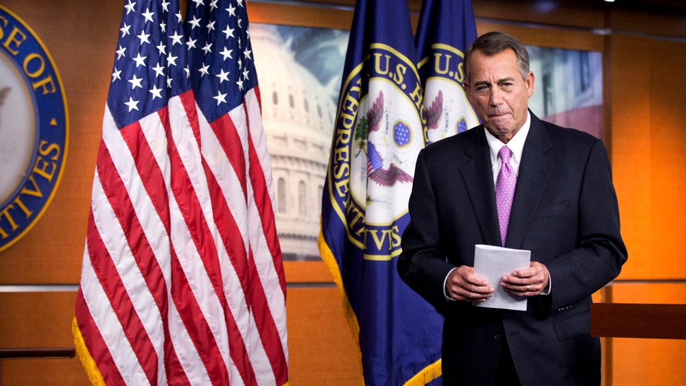 House Speaker John Boehner of Ohio leaves a news conference on Capitol Hill in Washington on Dec. 5, 2013.