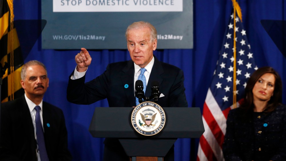 Vice President Joe Biden, flanked by Attorney General Eric Holder, left, and actress Mariska Hargitay, gestures as he speaks about reducing domestic violence, Wednesday, March 13, 2013, at the Montgomery County Executive Office Building in Rockville,...