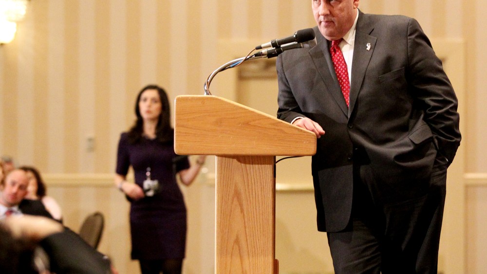 New Jersey Gov. Chris Christie listens to a question from the audience at the 3rd Annual Lincoln-Reagan Dinner at The Grappone Center, Feb. 16, 2015, in Concord, N.H. (Photo by Mary Schwalm/AP)
