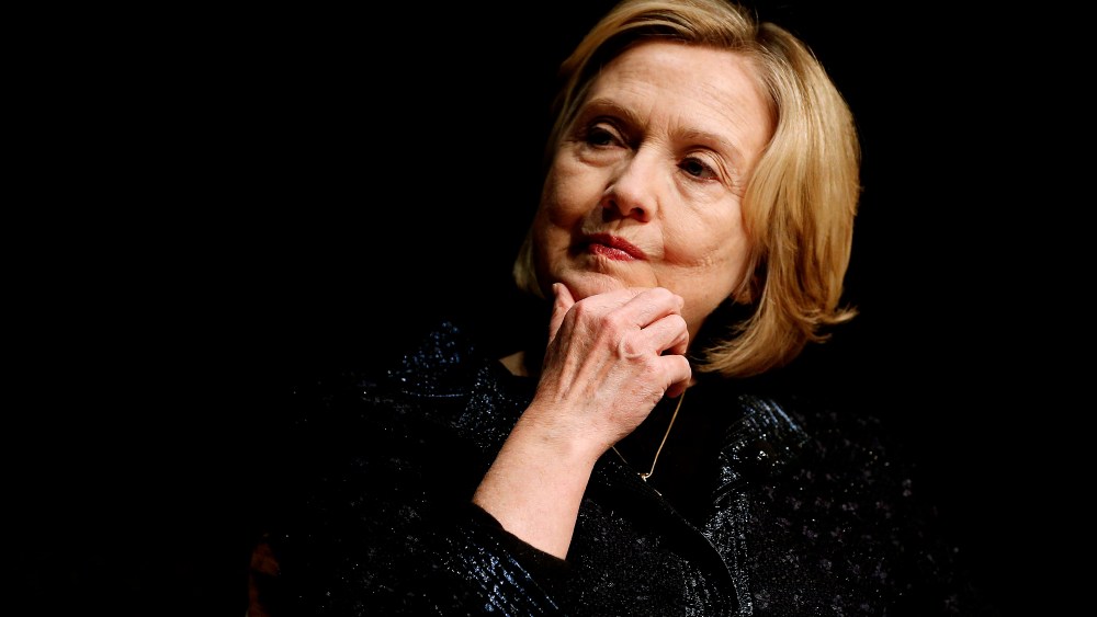 Former US Secretary of State Hillary Rodham Clinton contemplates during a question and answer session with Victor Dodig of CIBC, at a Winnipeg Chamber of Commerce luncheon in Winnipeg, Canada, Jan. 21, 2015. (Photo by John Woods/The Canadian Press via AP)