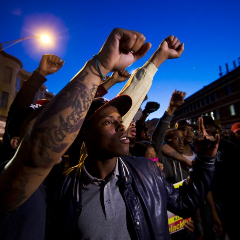 Protestors gather on April 28, 2015, in Baltimore, Md. (Photo by Matt Rourke/AP)