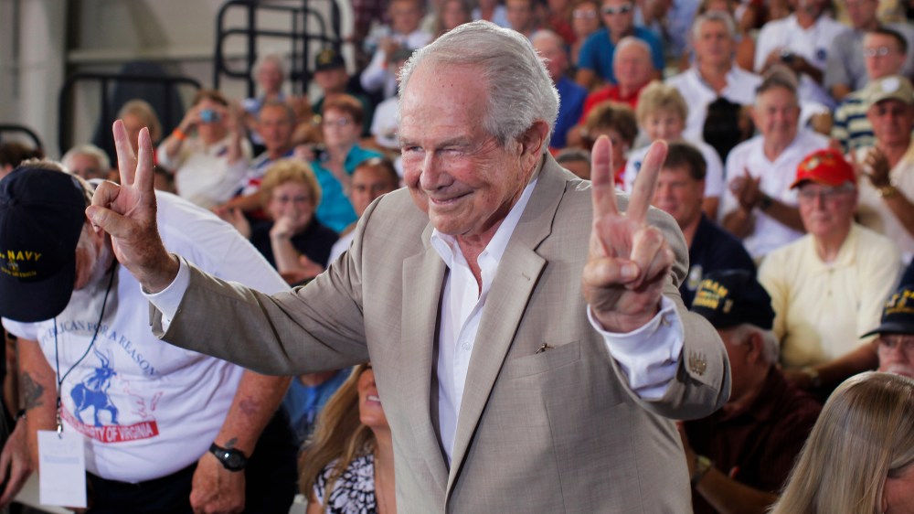 Evangelist Pat Robertson acknowledges the audience before he takes a seat before Republican presidential candidate Mitt Romney campaigns in Virginia Beach, Va., on Sept. 8, 2012.