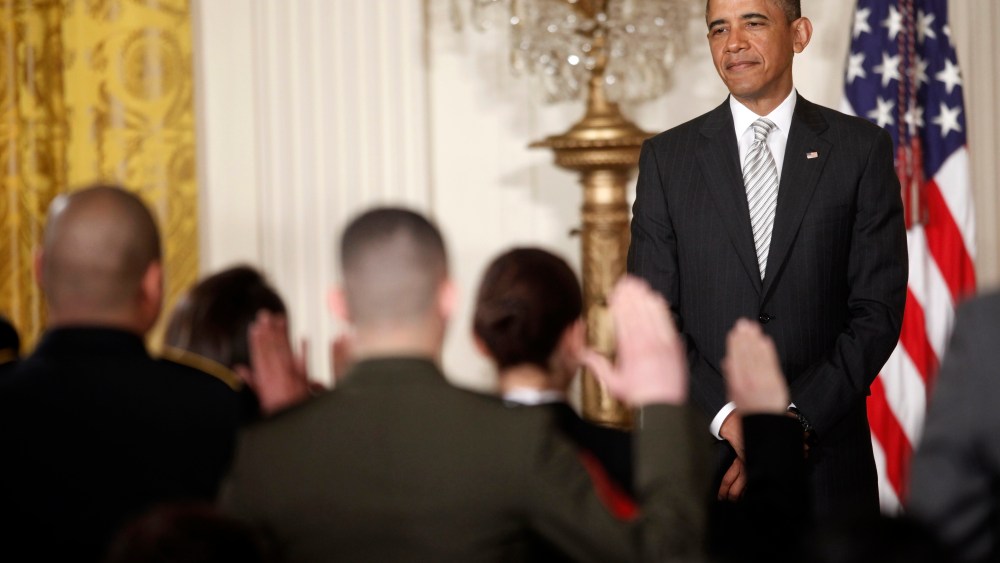 President Barack Obama, watches as the Oath of Allegiance is administered at a naturalization ceremony for active duty service members and civilians, Monday, March 25, 2013, in the East Room of the White House in Washington. (AP Photo/Pablo Martinez...