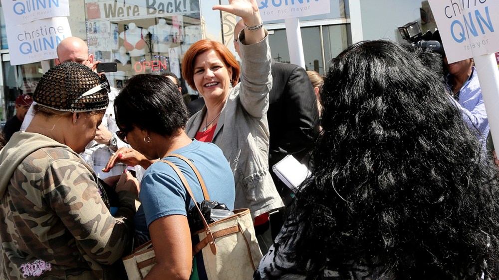 New York City Democratic mayoral hopeful and City Council Speaker Christine Quinn, center, waves at supporters during a campaign stop in the Bronx borough of New York, Thursday, Sept. 5, 2013.