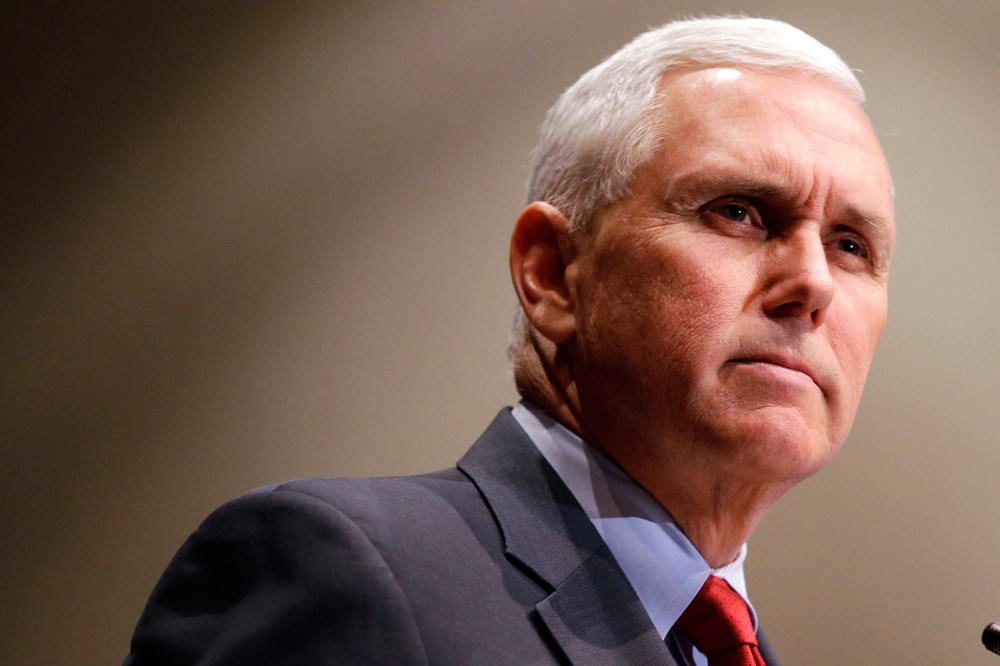 In this Jan. 27, 2015 file photo, Indiana Gov. Mike Pence pauses during a speech in Indianapolis, Ind. (Photo by Michael Conroy/AP)