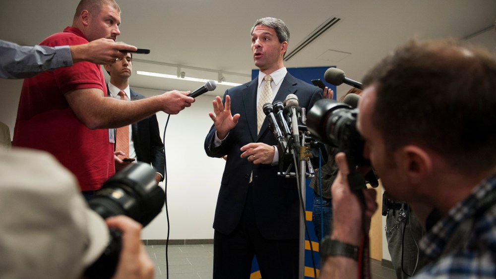 Virginia Republican gubernatorial candidate Ken Cuccinelli speaks with reporters following his address to the Virginia Energy and Opportunity Forum in Arlington, Va., Thursday, Aug. 29, 2013.