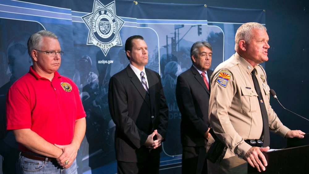 Colonel Frank Milstead, Director of Department of Public Safety holds a press conference to announce the arrest of a suspect in the Phoenix freeway shootings, at DPS headquarters, Sept.18, 2015. (Photo by David Wallace/The Arizona Republic/AP)