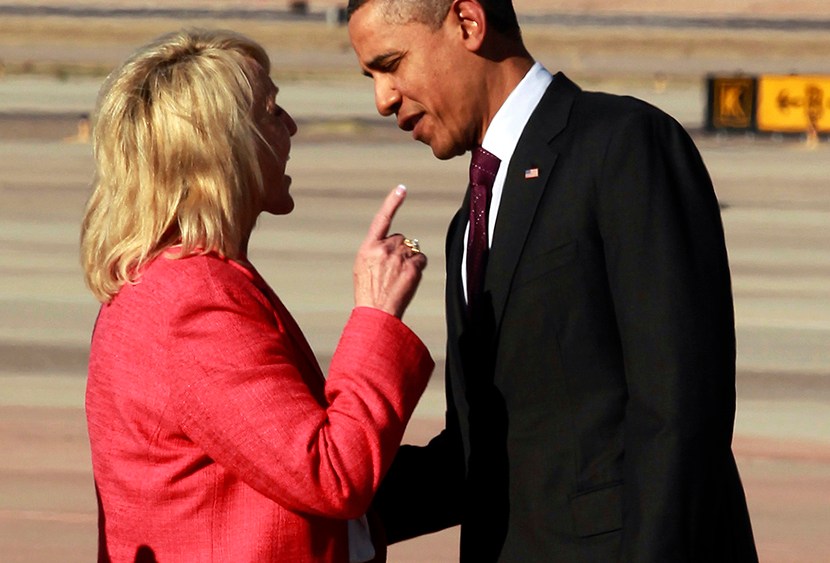 Arizona Gov. Jan Brewer points during an intense conversation with President Barack Obama after he arrived at Phoenix-Mesa Gateway Airport in Mesa, Arizona, Jan. 25, 2012. (Photo by Haraz N. Ghanbari/AP)