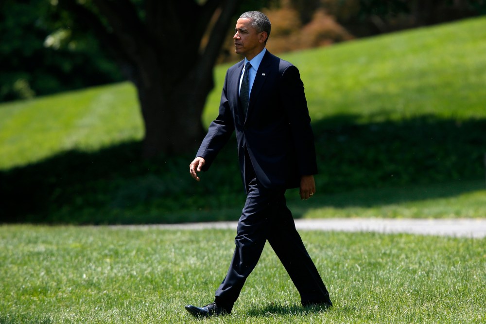 President Barack Obama walks on the South Lawn of the White House in Washington, D.C., May 22, 2014.