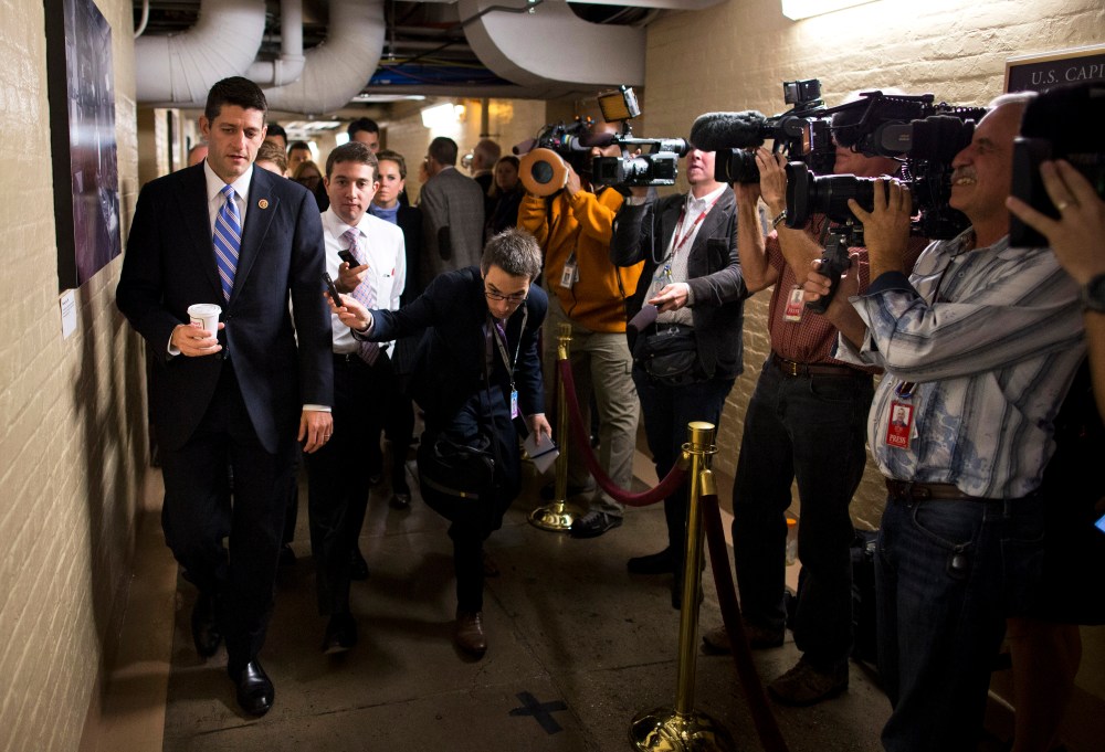 House Budget Committee chairman Rep. Paul Ryan walks to a House GOP meeting on Capitol Hill on Oct. 15, 2013 in Washington.