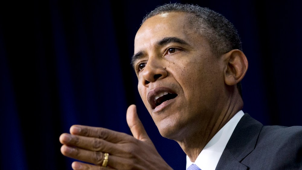 President Barack Obama gestures as he speaks during an Expanding College Opportunity event, Jan. 16, 2014.