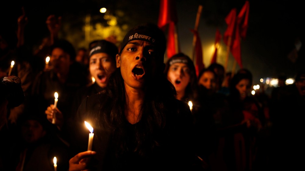 Indians take out a candle light vigil on the first anniversary of the brutal rape and murder of a young student in New Delhi, India, Dec. 16, 2013.