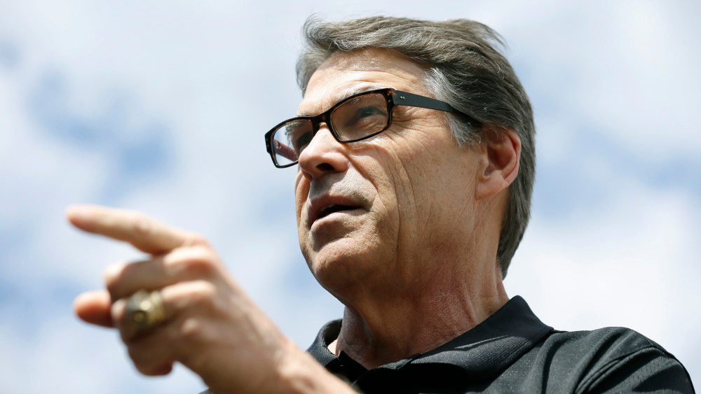 Texas Gov. Rick Perry speaks at the Des Moines Register's Political Soapbox at the Iowa State Fair, Tuesday, Aug. 12, 2014, in Des Moines, Iowa.