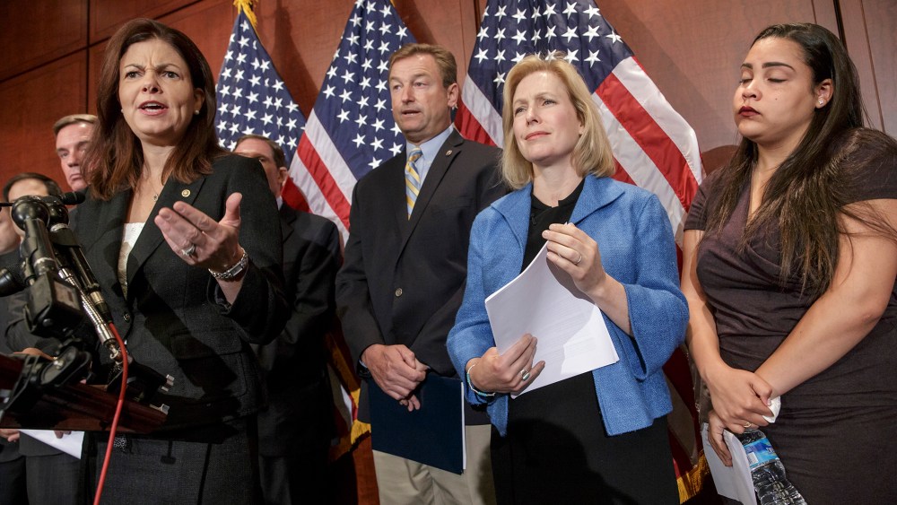 From left, Sen. Kelly Ayotte, R-N.H., Sen. Dean Heller, R-Nev., Sen. Kirsten Gillibrand, D-N.Y., and Anna, a survivor of sexual assault, appear at a news conference on Capitol Hill in Washington, D.C., July 30, 2014, to discuss "Campus Accountability and