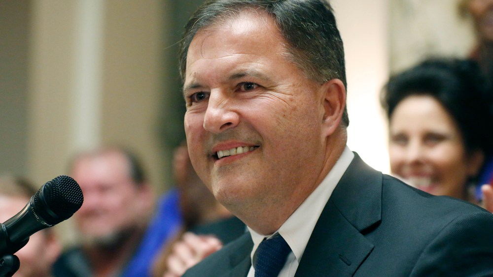 Former state Sen. Tim Johnson of Madison, smiles after announcing among representatives of various Mississippi Democratic associations that he is switching from Republican to Democrat to run for lieutenant governor of Mississippi.