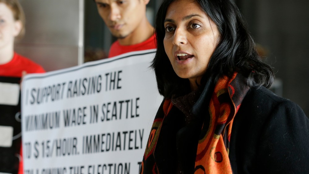 Socialist candidate for Seattle City Council Kshama Sawant speaks outside City Council chambers in Seattle on Nov. 4, 2013.