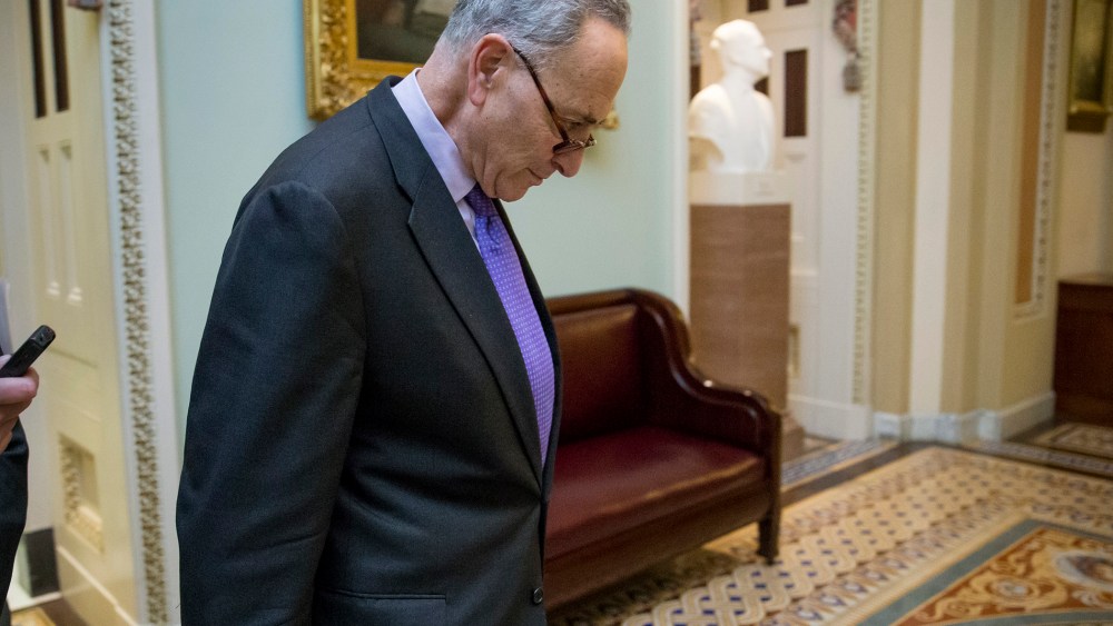 Sen. Chuck Schumer, D-N.Y., returns to the chamber after leading Senate Democrats in offering a series of gun control amendments to the budget bill, which the GOP-controlled Senate voted against, Dec. 3, 2015. (Photo by J. Scott Applewhite/AP)