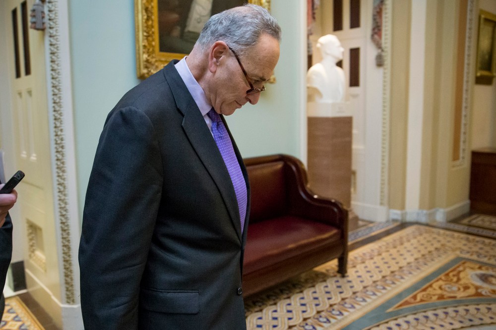 Sen. Chuck Schumer, D-N.Y., returns to the chamber after leading Senate Democrats in offering a series of gun control amendments to the budget bill, which the GOP-controlled Senate voted against, Dec. 3, 2015. (Photo by J. Scott Applewhite/AP)