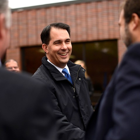 Governor Scott Walker visits with people during an event in Green Bay, Wis., on Oct. 24, 2014. (Evan Siegle/Green Bay Press-Gazette/AP)