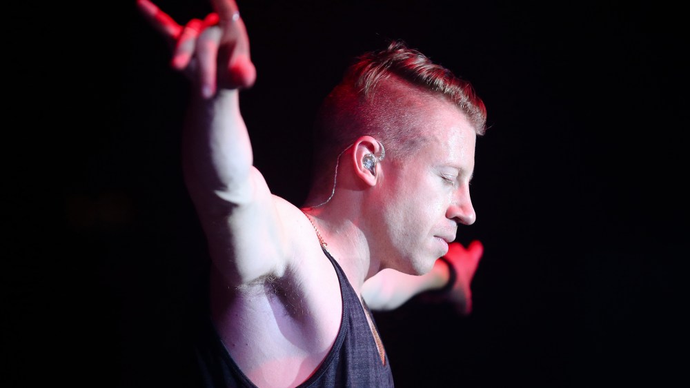 Hip-hop artist Macklemore preforms at the Best Buy Theater in Times Square on Nov. 21, 2013, in New York.