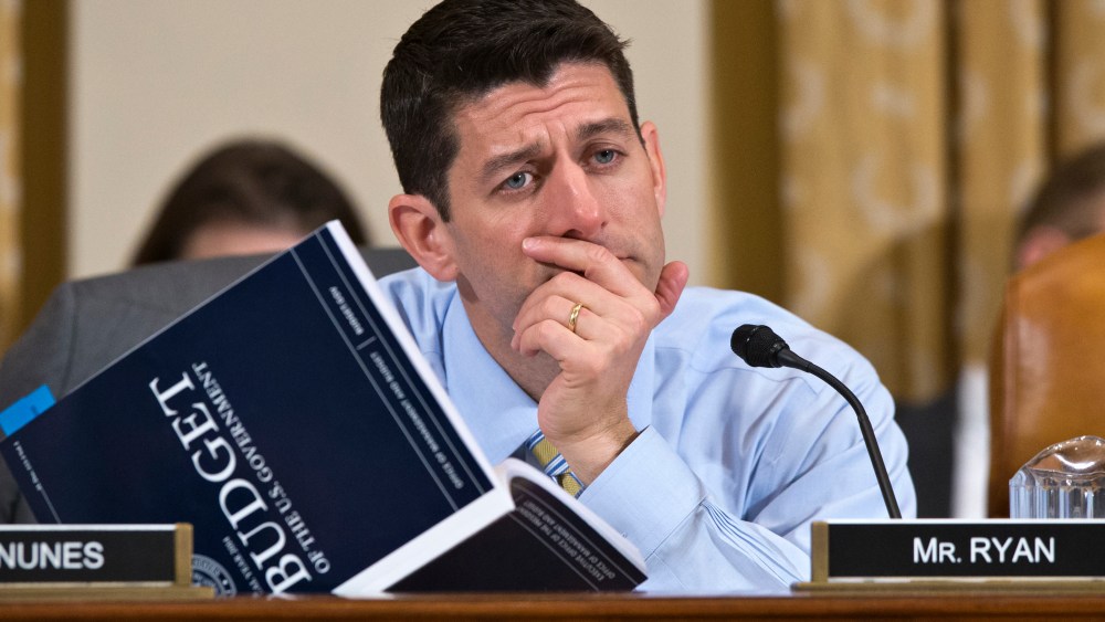 House Budget Committee Chairman Rep. Paul Ryan, R-Wis., a member of the House Ways and Means Committee, holds a copy of President Barack Obama's fiscal 2014 budget proposal book as he questions Health and Human Services (HHS) Secretary Kathleen...