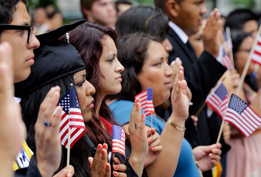 DREAMers (Development, Relief, and Education for Alien Minors) and parents take an oath in a mock citizenship ceremony during a "United We Dream," rally on Capitol Hill in Washington, Wednesday, July 10, 2013, sending a signal to the House of...