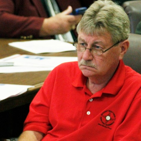 Gene Alday, R-Walls, listens to a collegue during a hearing  in Jackson, Miss., Oct. 2, 2012. (Photo by Rogelio V. Solis/AP)