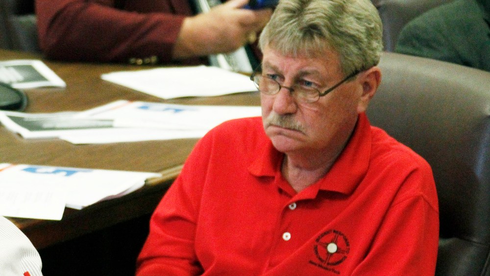 Gene Alday, R-Walls, listens to a collegue during a hearing  in Jackson, Miss., Oct. 2, 2012. (Photo by Rogelio V. Solis/AP)