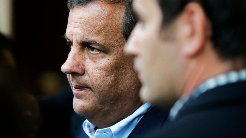 Chris Christie talks with reporters at the National Governors Association convention, July 12, 2014.