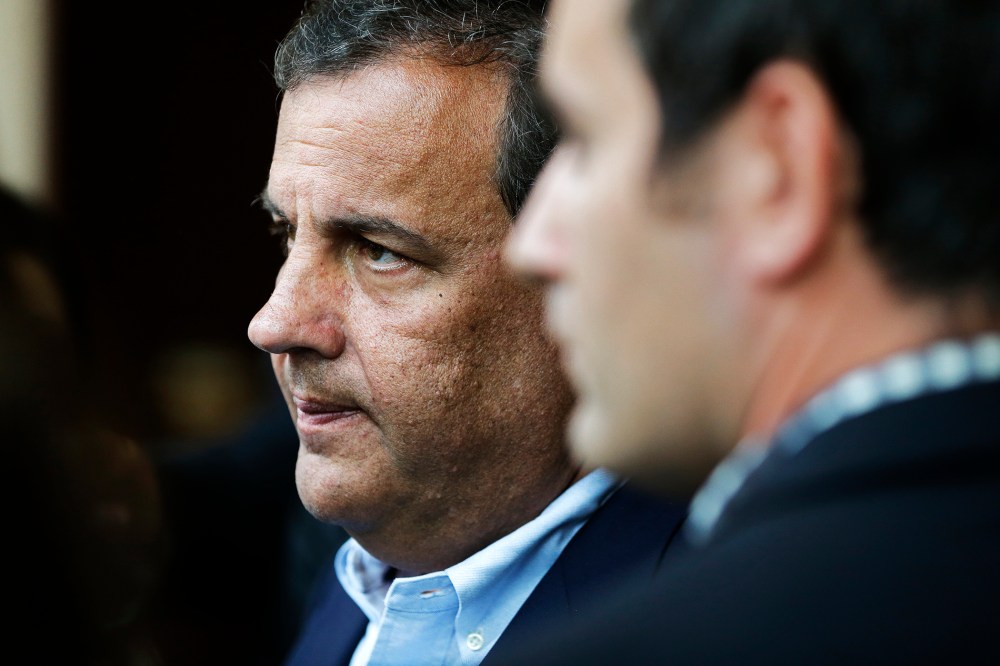 Chris Christie talks with reporters at the National Governors Association convention, July 12, 2014.