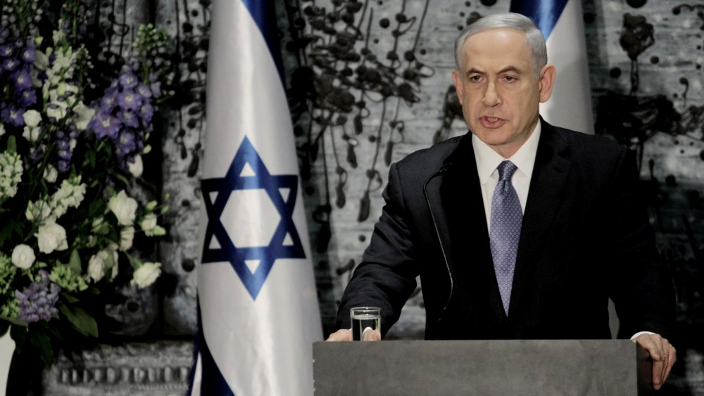 Israeli Prime Minister Benjamin Netanyahu speaks during a ceremony with Israeli President Reuven Rivlin, not seen, in Jerusalem, March 25, 2015. (Photo by Dan Balilty/AP)