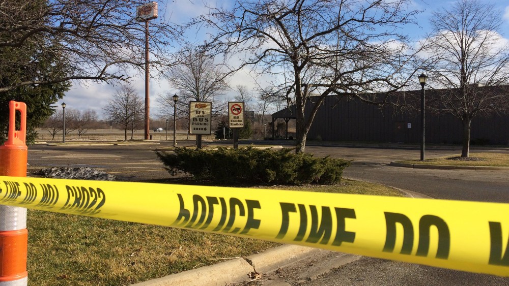 Police tape surrounds the area of a random shooting on Feb. 21, 2016, in Kalamazoo, Mich. Jason Dalton of Kalamazoo County was arrested early Sunday in downtown Kalamazoo after several victims were shot at random. (Photo by Jeff Karoub/AP)