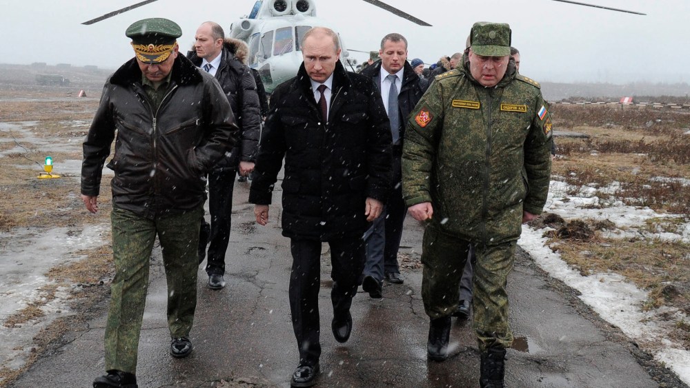 Russian President Vladimir Putin arrives to watch a military exercise near St.Petersburg, Russia, March 3, 2014.