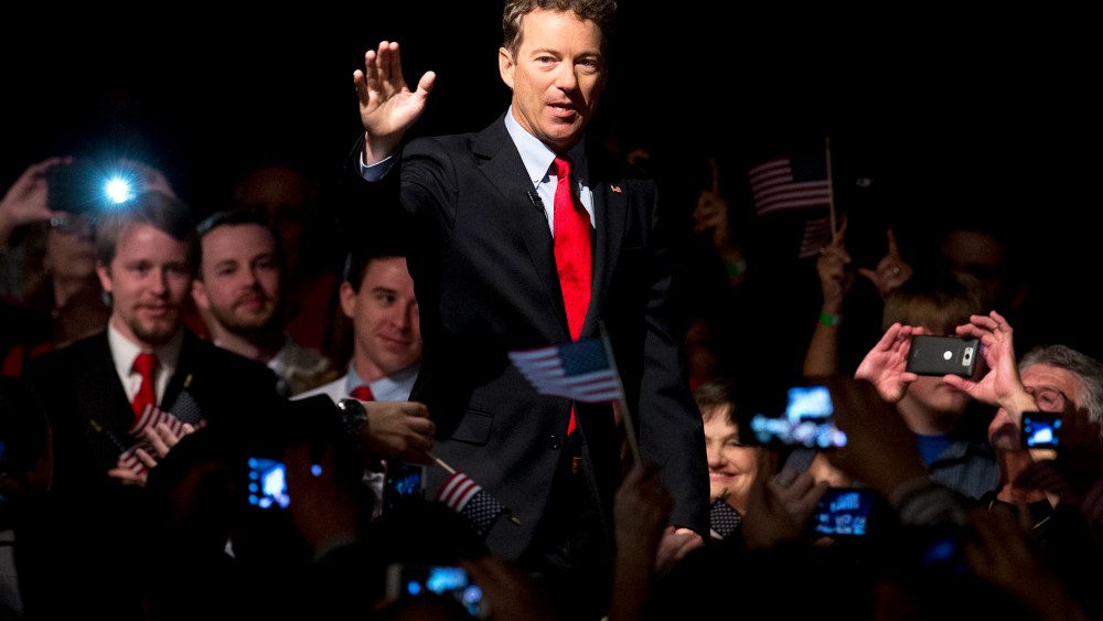 Sen. Rand Paul, R-Ky. arrive to a cheering and photo taking crowd for his announcement of the start of his presidential campaign, April 7, 2015, at the Galt House Hotel in Louisville, Ky. (Photo by Carolyn Kaster/AP)