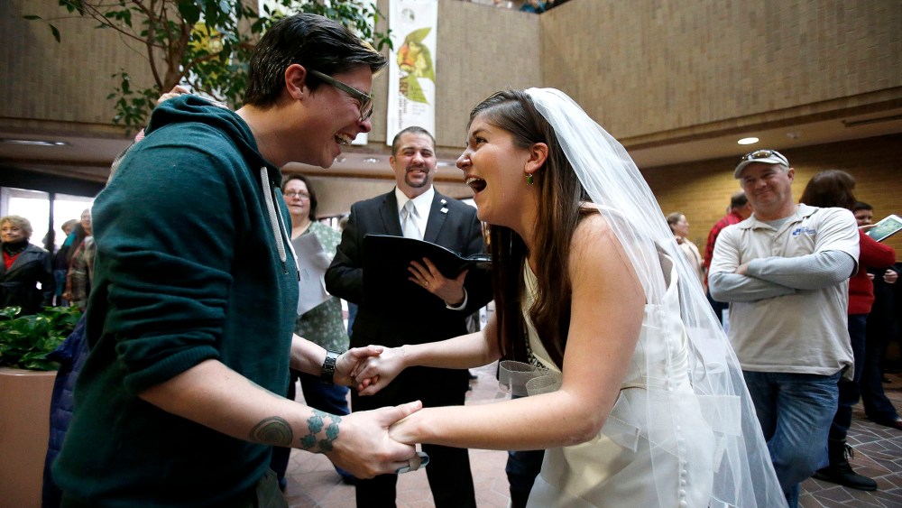 Jax and Heather Collins get married at the Salt Lake County clerk's office, Dec 23, 2013.