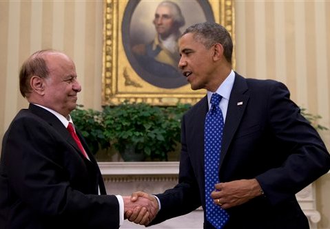 President Barack Obama and Yemen's president Abdo Rabby Mansour Hadi shake hands, Aug. 1, 2013. (AP Photo/Carolyn Kaster)