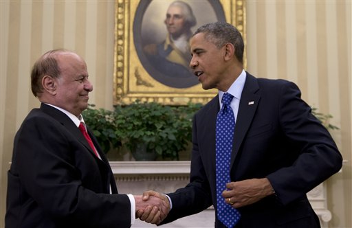President Barack Obama and Yemen's president Abdo Rabby Mansour Hadi shake hands, Aug. 1, 2013. (AP Photo/Carolyn Kaster)